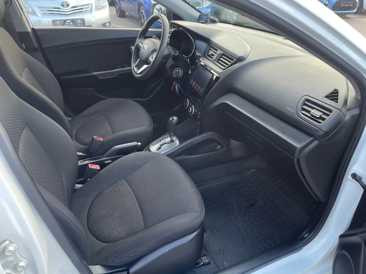 Kia Rio 1.6 AT (123 л.с.), 2013 — фото 6