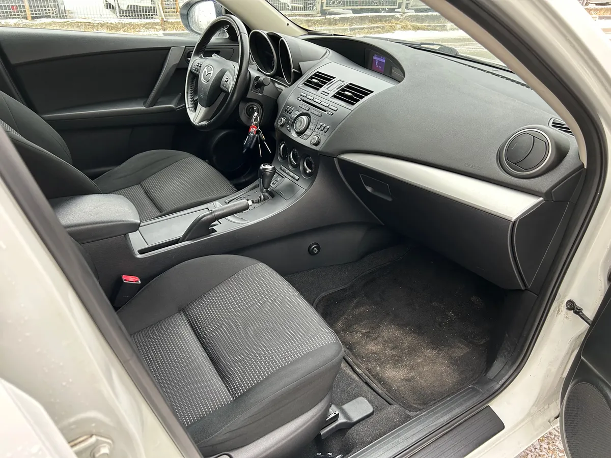 Mazda 3 1.6 AT (104 л.с.)