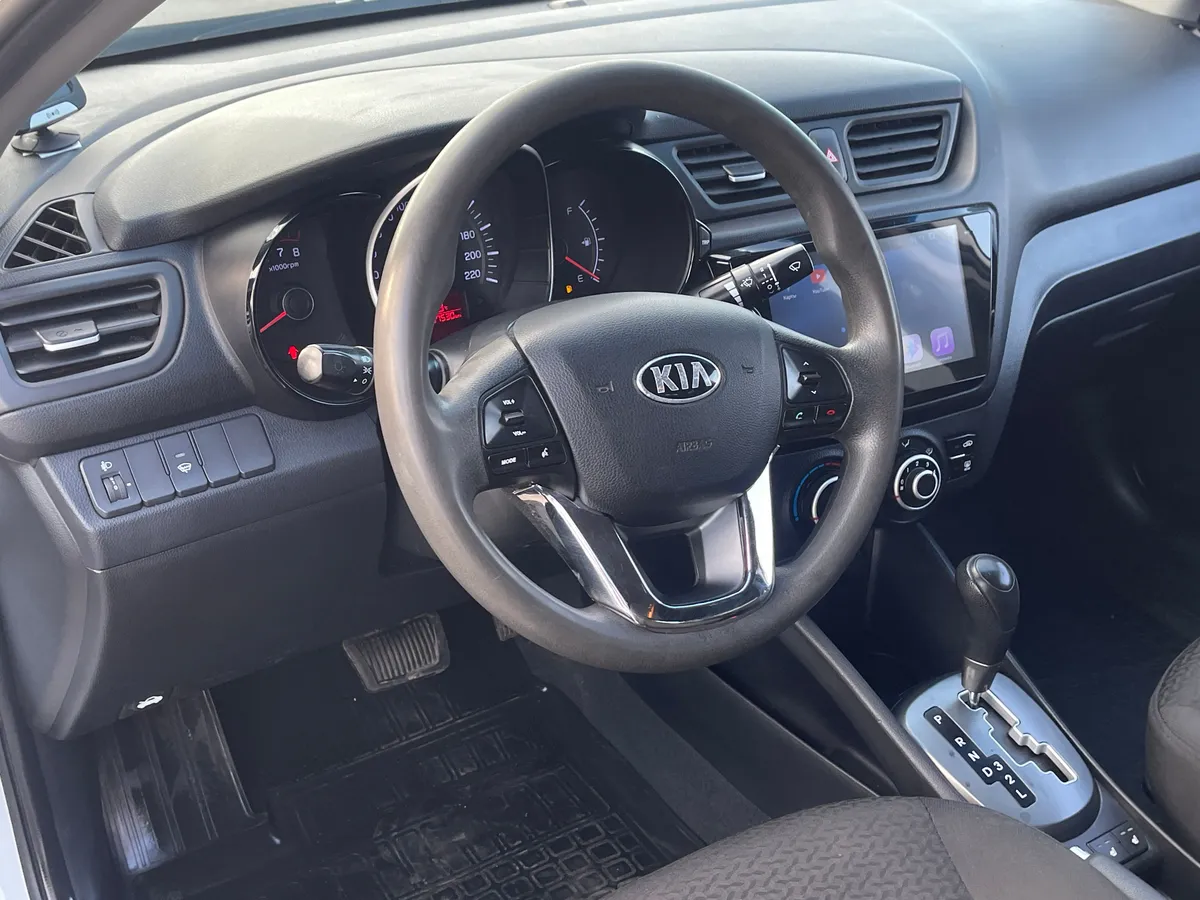 Kia Rio 1.6 AT (123 л.с.), 2013 — фото 5