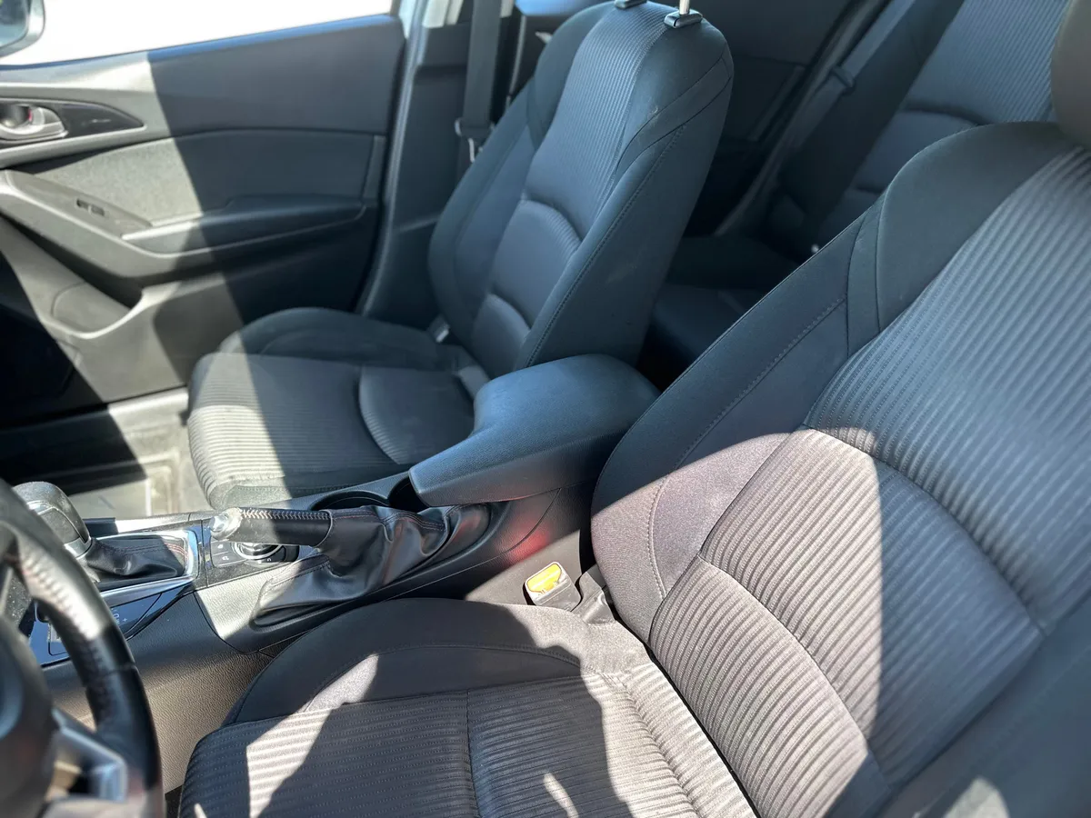 Mazda 3 1.6 AT (104 л.с.)