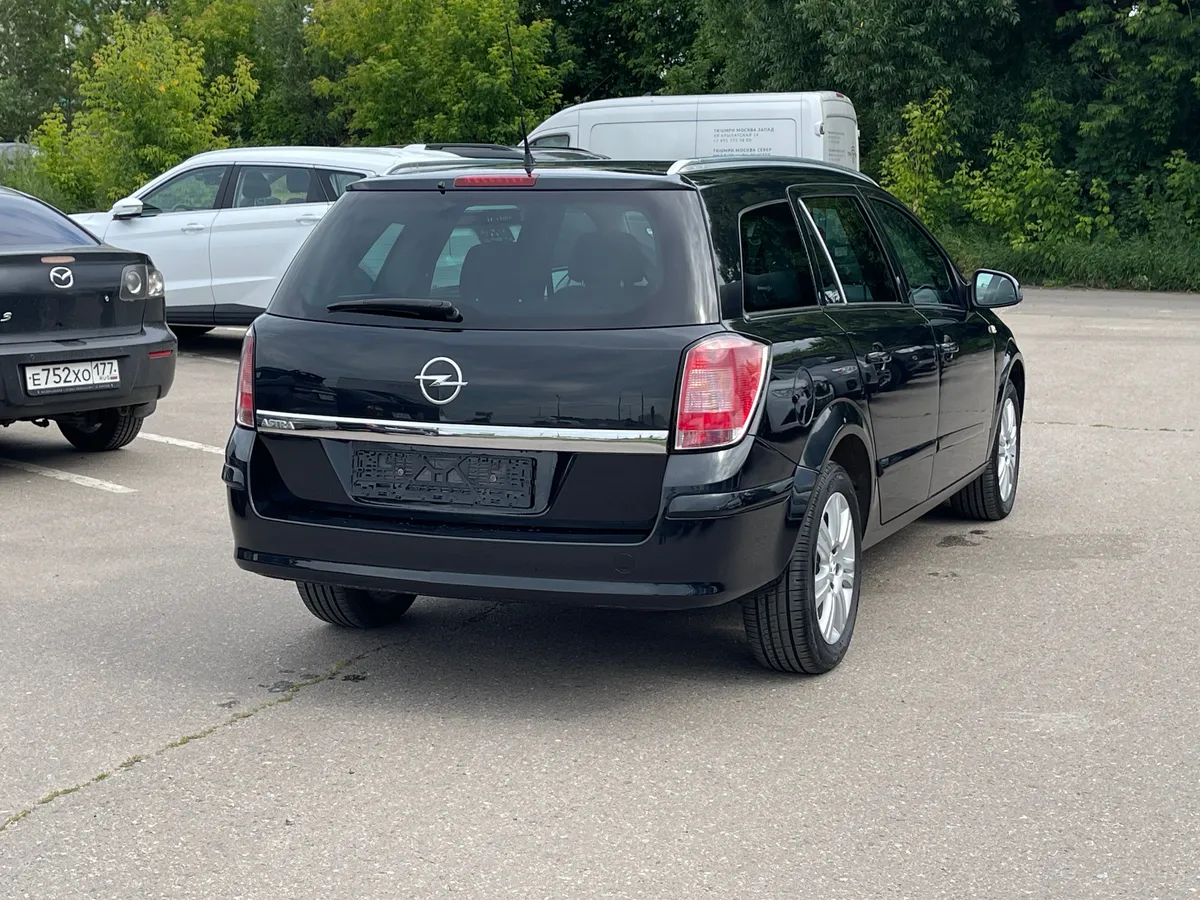 Opel Astra 1.8 MT (140 л.с.), 2012 — фото 4