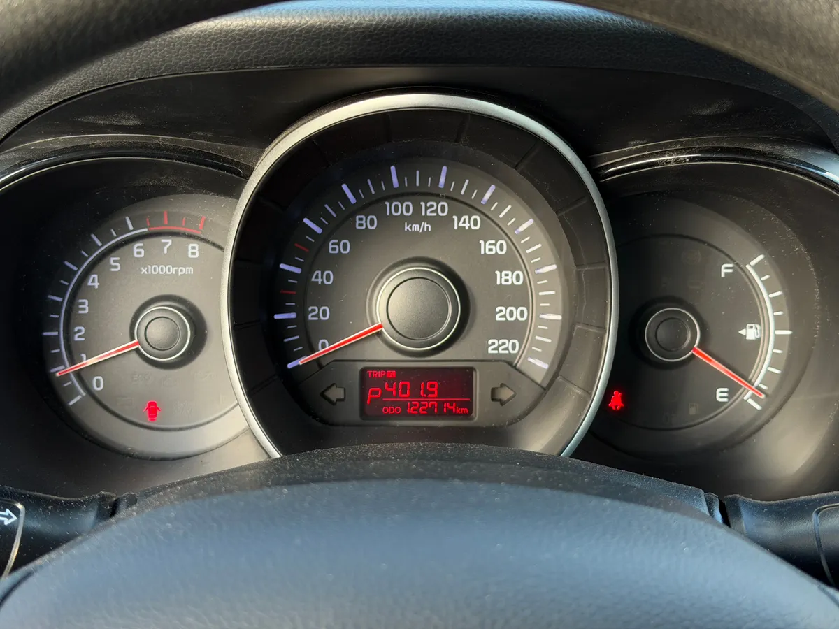 Kia Rio 1.4 AT (107 л.с.)