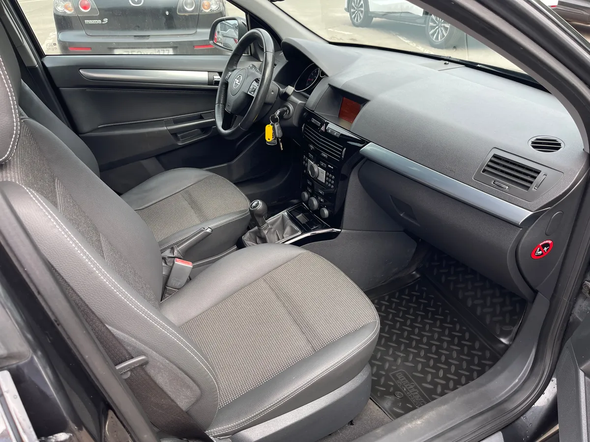 Opel Astra 1.8 MT (140 л.с.), 2012 — фото 6
